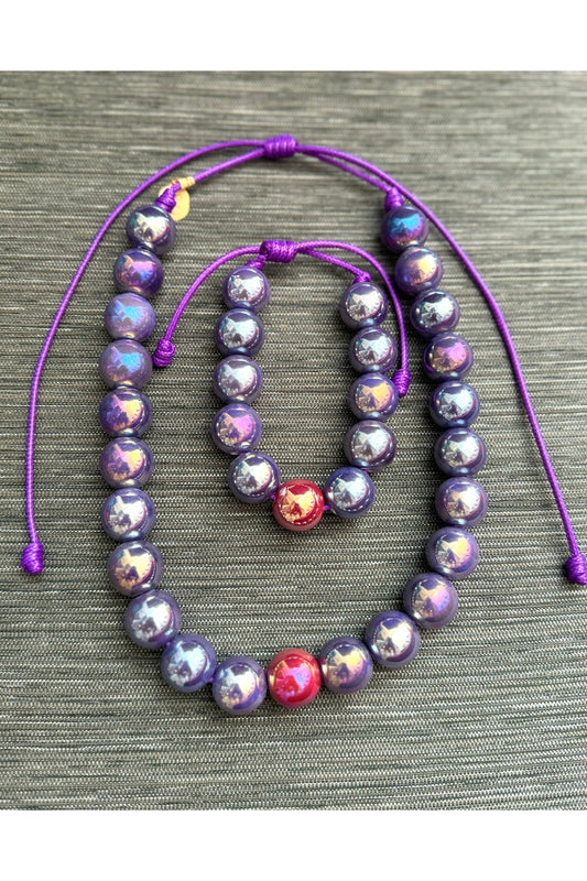 Set of necklace and bracelet with metallic balls